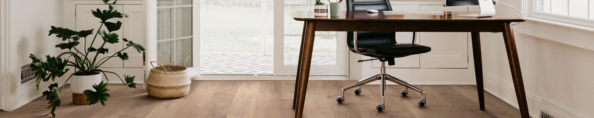 Office in vintage style with brown rustic hardwood floor from Expressway Carpet in Mobile, AL