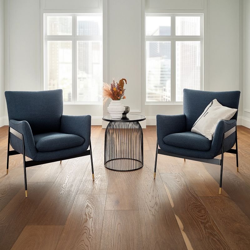 two blue armchairs on brown hardwood flooring from Expressway Carpet in Mobile, AL