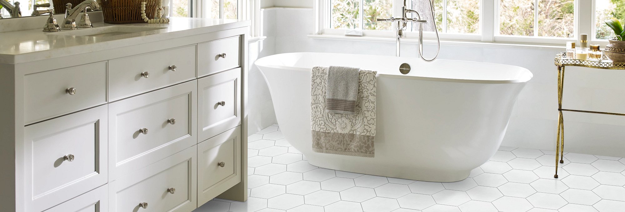 Bright bathroom with white tiles from Expressway Carpet in Mobile, AL